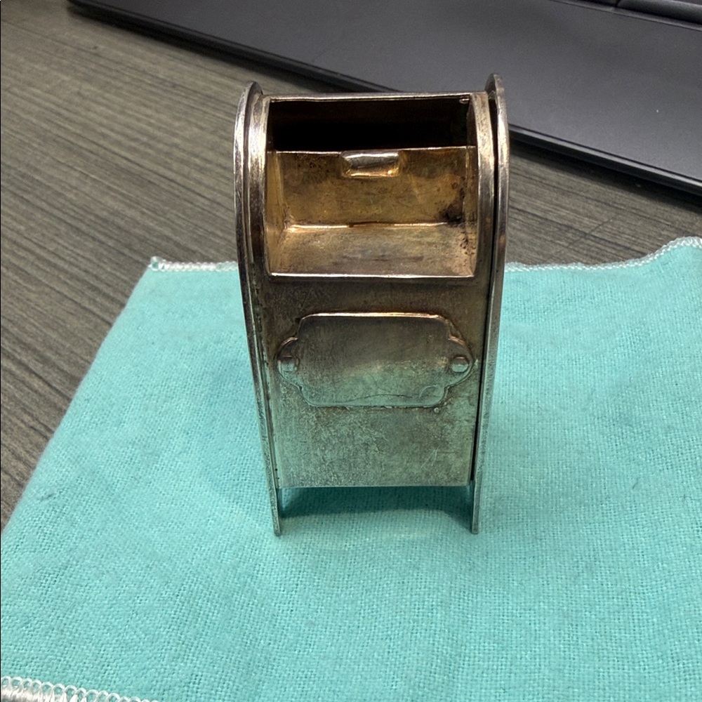 Tiffany & Co. Silver Metal Cube Accent on Blue Felt